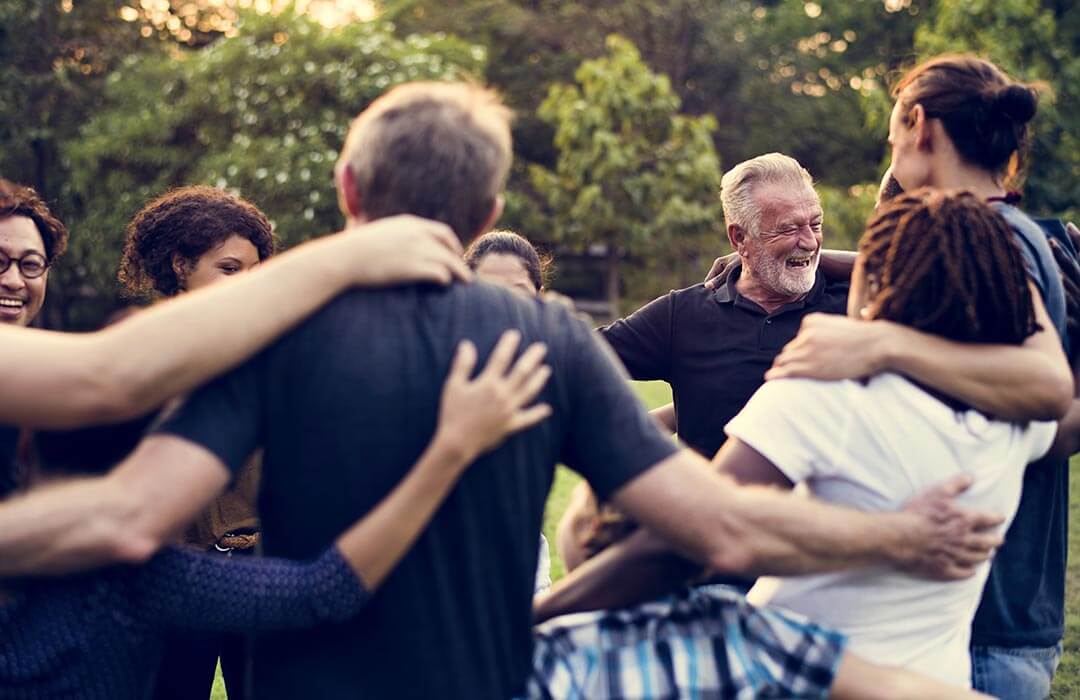 Community group in the park with Your Own Way.